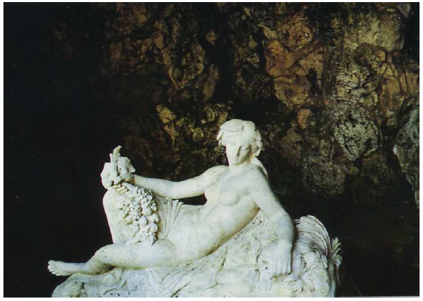 Fig. 23: Modern statue of the Nymph of the River Seine by the Sculptor Jouffroy, situated in an artificial grotto, near the ancient Gallo-Roman sanctuary of the Sources-de-la-Seine dedicated to the Celtic goddess Sequana. Deyts, 1985, p. 9.