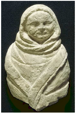 Fig. 15: Representation in stone of a wrapped baby. (Sources-de-la-Seine). Source: Musée archéologique de Dijon.