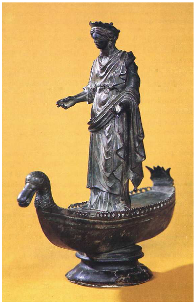 Fig. 12: Statue in bronze of Sequana standing on a boat with a duck-headed prow (Sources-de-la-Seine). H. 0.615m and weight: 7.560 kg. In the Musée Archéologique de Dijon. Deyts, 1985, p. 8.