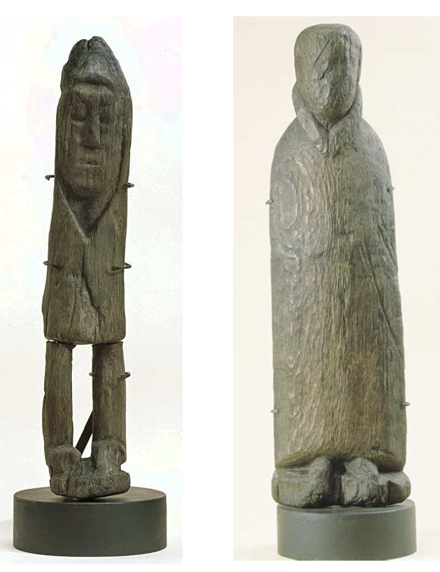 Fig. 16: Statues in wood discovered at the Sources-de-la-Seine, representing pilgrims wearing the Gaulish bardocucullus*. Source: Musée archéologique de Dijon